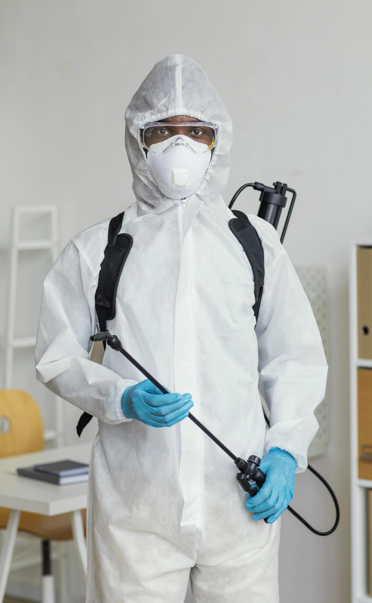 person-protective-suit-getting-ready-disinfect-room